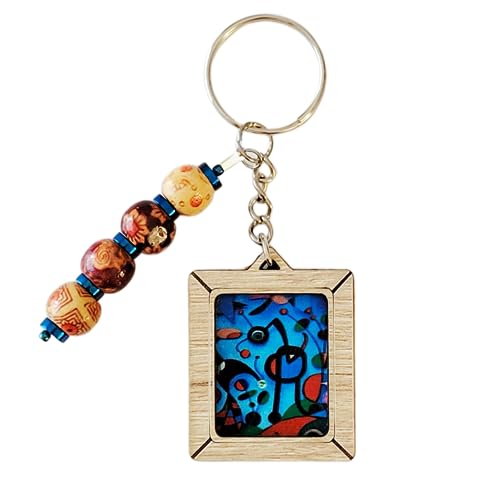 DETÚATÚ.SHOP Llavero artesanal: Replica detallada en madera de El Jardín del pintor Joan Miró, una exquisita pieza inspirada en la maestría del famoso pintor surrealista. Arte en tus manos.